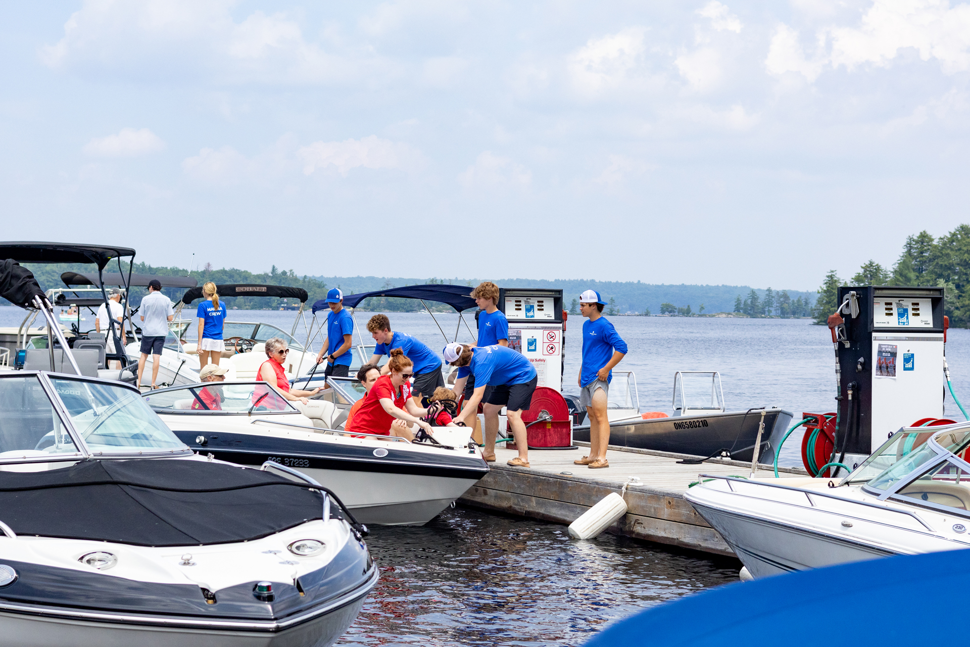 Waterfront staff are helping customers at a marina in Ontario