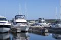 Yacht docked at Beacon Bay Marina